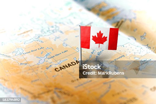 istock Canada pinned on the map with flag 583794892