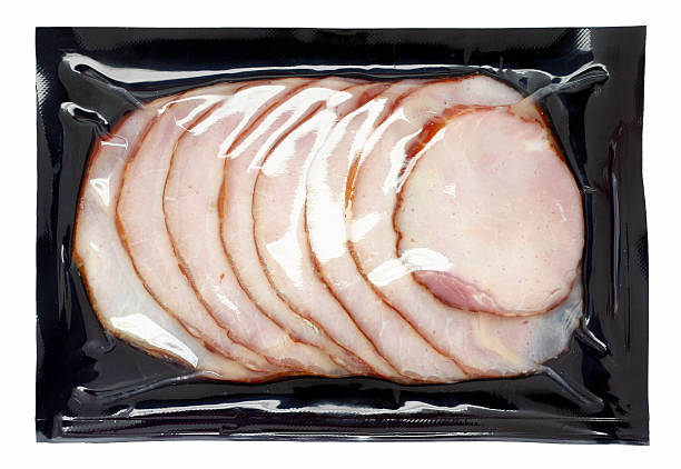 Canadian bacon "A package of Canadian bacon, isolated on white." airtight stock pictures, royalty-free photos & images
