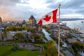 istock Canadian flag flying over Old Quebec City 1178852373