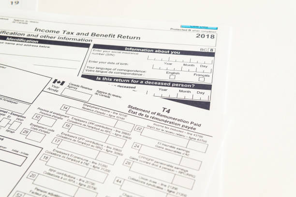 Canadian T1 and T4 tax forms stock photo