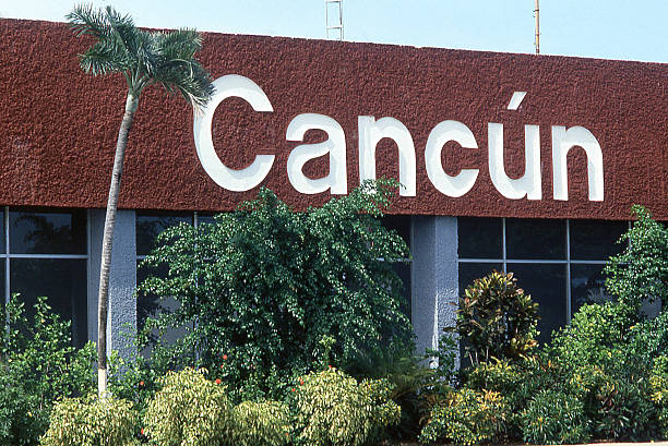 Cancun sign on Airport Building Yucatan Mexico stock photo