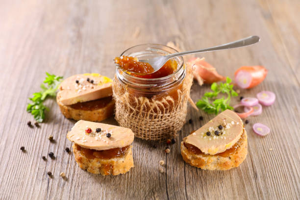 candied onion and toast with foie gras candied onion and toast with foie gras goose meat photos stock pictures, royalty-free photos & images