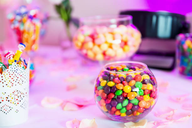 Candies in jar & wedding sweet bar Horizontal color image of wedding sweet bar - variation of sweet candies in jar arranged on table. candy jar stock pictures, royalty-free photos & images