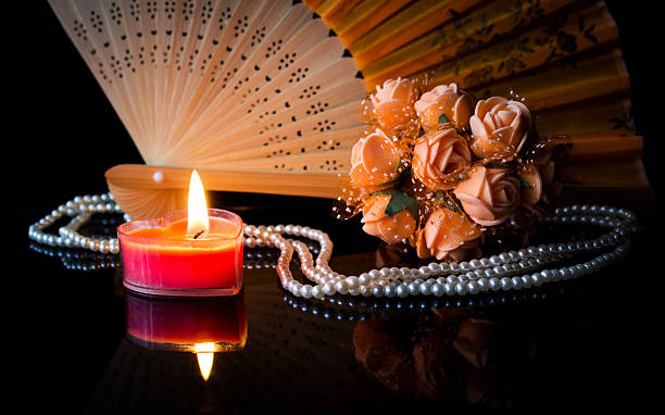 Candle and roses stock photo