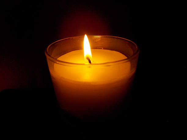 Candle for a Vigil in Remembrance stock photo