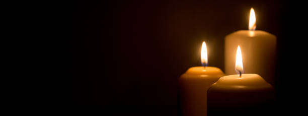 Candle Ritual candle on black vackground memorial photos stock pictures, royalty-free photos & images