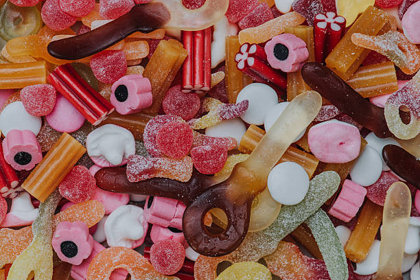 Candy on background Candy on background pick and mix stock pictures, royalty-free photos & images