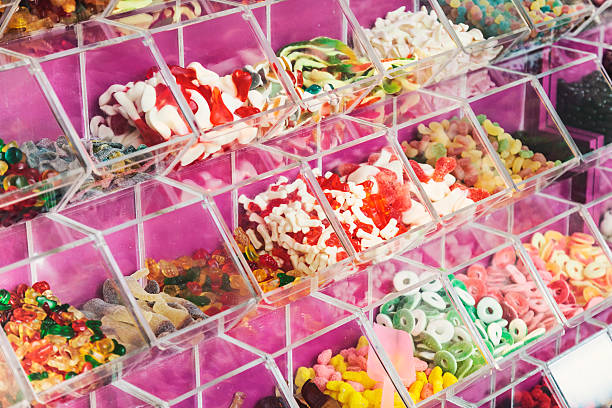Candy Shop Childrens sweets on caramel store display pick and mix stock pictures, royalty-free photos & images