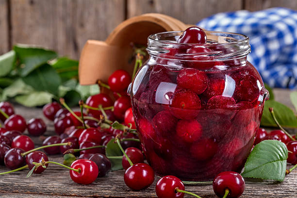 Canned cherries stock photo
