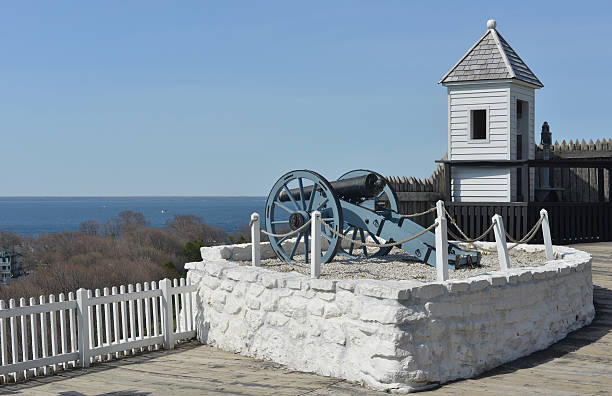 Cannon and watchtower, Fort Mackinac, Michigan View of a cannon at Fort Mackinac. Fort Mackinac, built in 1780 by the British to control strategic Straits of Mackinac, between Lake Michigan and Lake Huron. After the Treaty of Paris (1783) it served as American military outpost until 1895. The fort is now a state park, located on Mackinac Island in Michigan, USA. mackinac island stock pictures, royalty-free photos & images