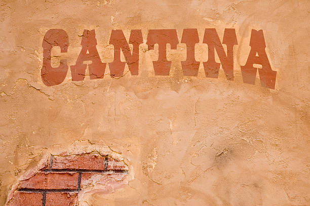 Cantina Sign Outside Bar, Brick Stucco Wall, Rustic, Cinco-de-Mayo stock photo
