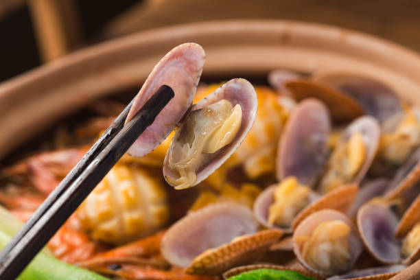 Cantonese style seafood rice pot stock photo