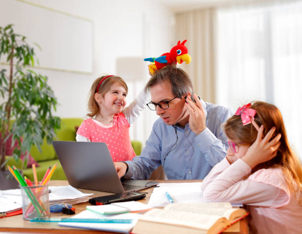 Caos - Father And Schoolgirl Working At Home - Telework And E-Learning Caos - Father And Schoolgirl Working At Home - Telework And E-Learning working from home stock pictures, royalty-free photos & images