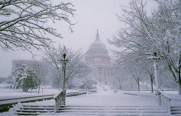 U.S. Capitol after morning snowstorm stock photo