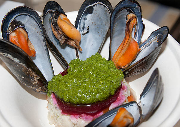 cappon magro with salsa and mussels stock photo