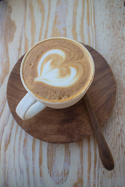 Cappuccino with froth decoration stock photo