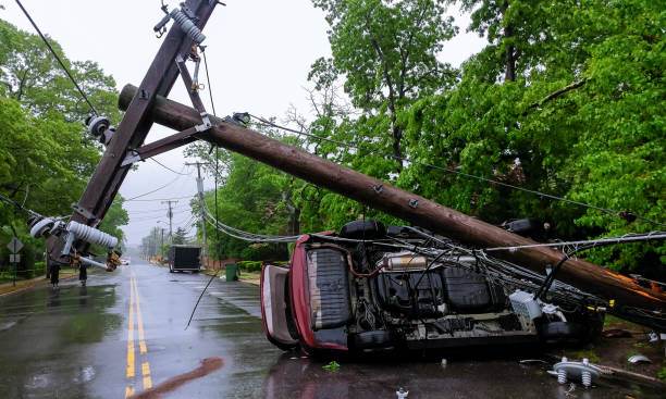 Car accident after a severe storm with crash electric pole Car turned over after accident with crash electric pole after a severe storm pole stock pictures, royalty-free photos & images