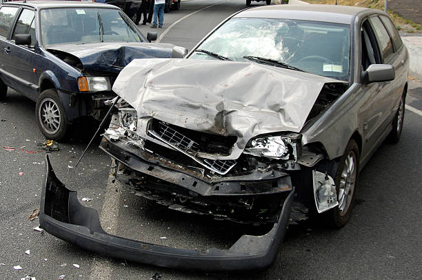 a car accident with major front end damage - auto ongeluk stockfoto's en -beelden