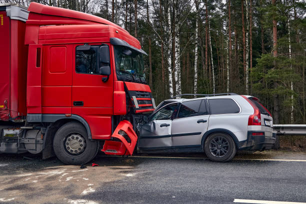 Car after a collision with a heavy truck January 24, 2020, Sauriesi, Latvia: car after a collision with a heavy truck, transportation background crash stock pictures, royalty-free photos & images