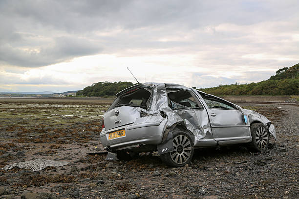 Car Crash Newtownards, northern Ireland, United Kingdom- August 11, 2015: This photo is of a car that came of the Portaferry road, Newtownards Northern Ireland and end up in Strangford lough lough. Where a young man in his 20's was badly injured with a broken neck.  strangford lough stock pictures, royalty-free photos & images