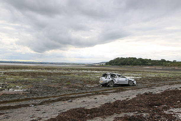 Car Crash Newtownards, northern Ireland, United Kingdom- August 11, 2015: This photo is of a car that came of the Portaferry road, Newtownards Northern Ireland and end up in Strangford lough lough. Where a young man in his 20's was badly injured with a broken neck strangford lough stock pictures, royalty-free photos & images