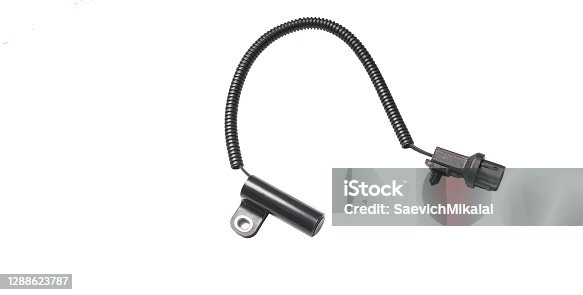 istock car engine crankshaft position sensor on isolated white background. 1288623787