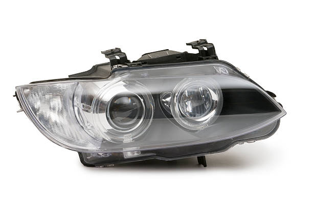 Car Headlight "A Headlight from a car, isolated on white.  Clipping Path on object." headlight stock pictures, royalty-free photos & images