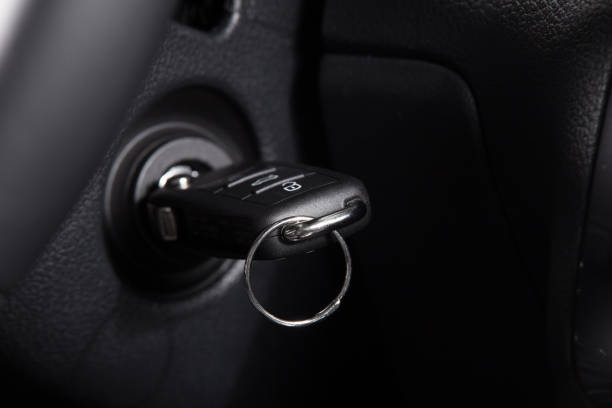 Car ignition key Car ignition key closeup. Car key in the ignition. ignition stock pictures, royalty-free photos & images
