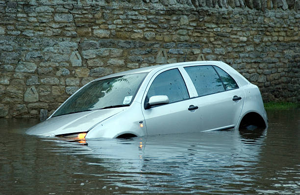 Car in rural Flooding stock photo