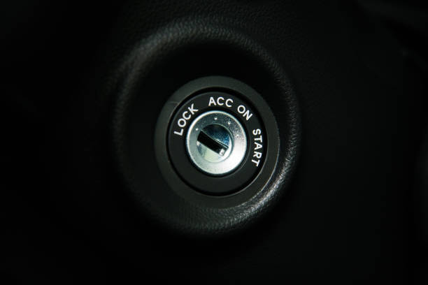 Car key into ignition lock Car interior details close-up. Car key into ignition lock ignition stock pictures, royalty-free photos & images