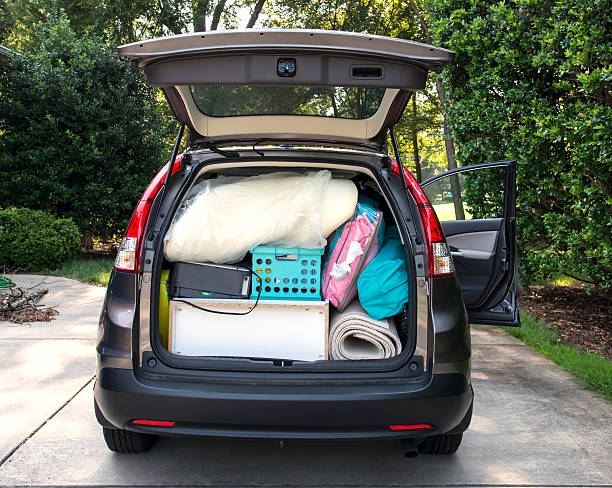 Car loaded for college move in Van loaded full of student's possessions ready to move to the university college dorm stock pictures, royalty-free photos & images