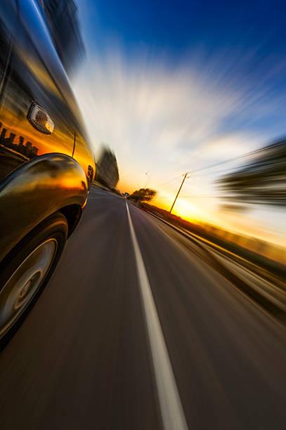 car on the road wiht motion blur background. stock photo