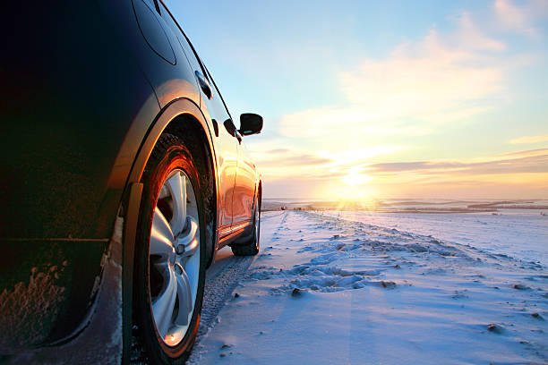 Car on winter road stock photo