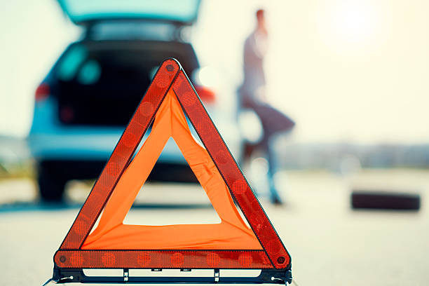 Car problems, red warning triangle! stock photo
