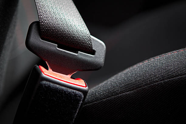 Car Seat Belt Safety must come first!  A car seat belt buckled. seat belt stock pictures, royalty-free photos & images