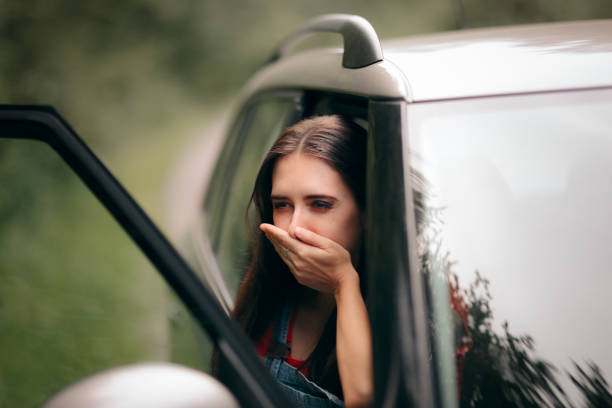 Car Sick Travel Woman with Motion Sickness Symptoms stock photo