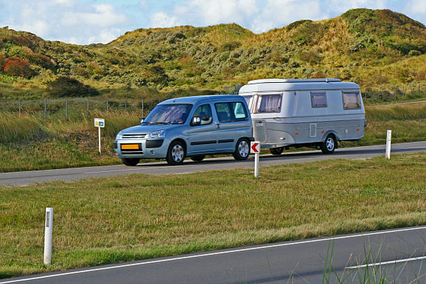 car with caravan # 14 - pensioen nederland stockfoto's en -beelden