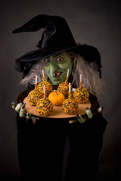 Caramel Apple Witch stock photo
