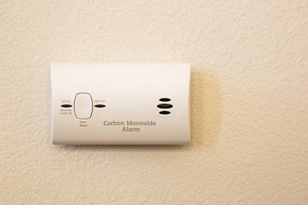 Carbon Monoxide Alarm Attached to Wall stock photo