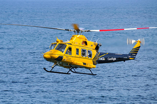 RACQ CareFlight helicopter in action stock photo