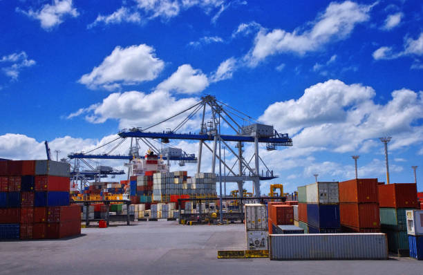 Cargo cranes in the port in Auckland, New Zealand. stock photo