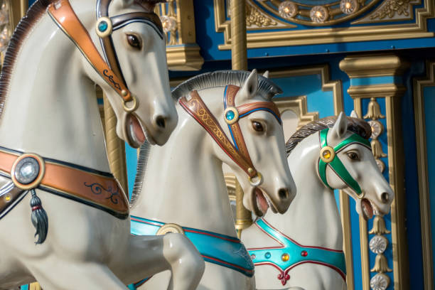 Carousel horses machine Carousel horses machine in the Amusement Park carousel horses stock pictures, royalty-free photos & images