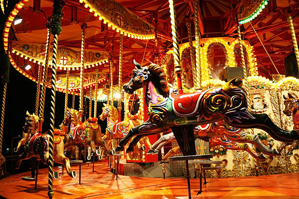 Carousel Carousel, shot at night carousel horses stock pictures, royalty-free photos & images