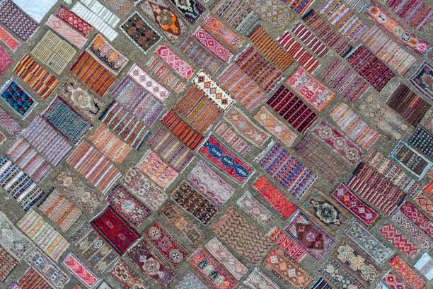 Carpet Field Aerial view of colourful carpets  under sunlight for accelerated ageing. Taken via drone anatolia stock pictures, royalty-free photos & images