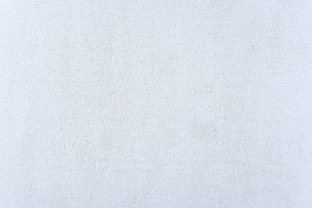 Carpet texture background. White cotton carpet for floor coverings. Material for interior design and decoration of living rooms stock photo