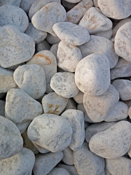 Carrara marble pebbles stock photo