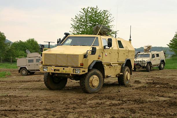 carrier military vehicle kmw dingo-2 on the unmade road - unimog - fotografias e filmes do acervo