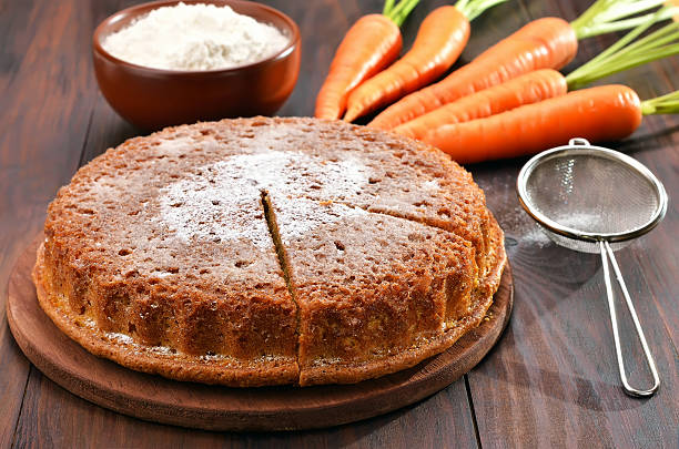 Carrot cake on wooden table stock photo
