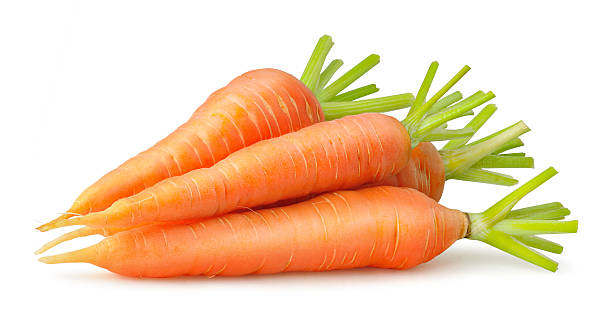 Carrots Heap of carrots isolated on white carrot stock pictures, royalty-free photos & images