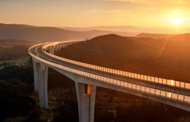 Cars driving on a highway viaduct stock photo